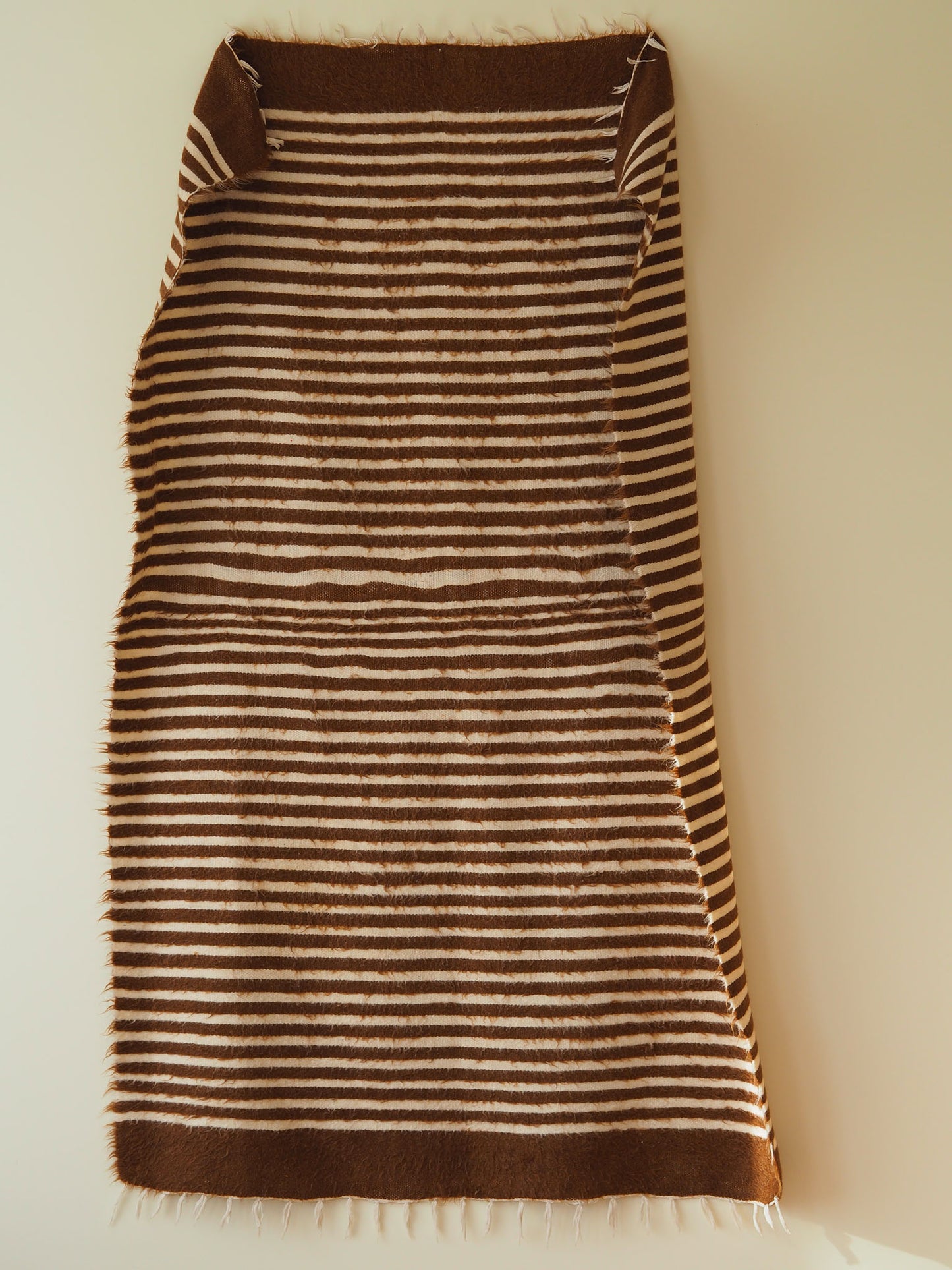 brown-white-striped-wall-hanging-rug