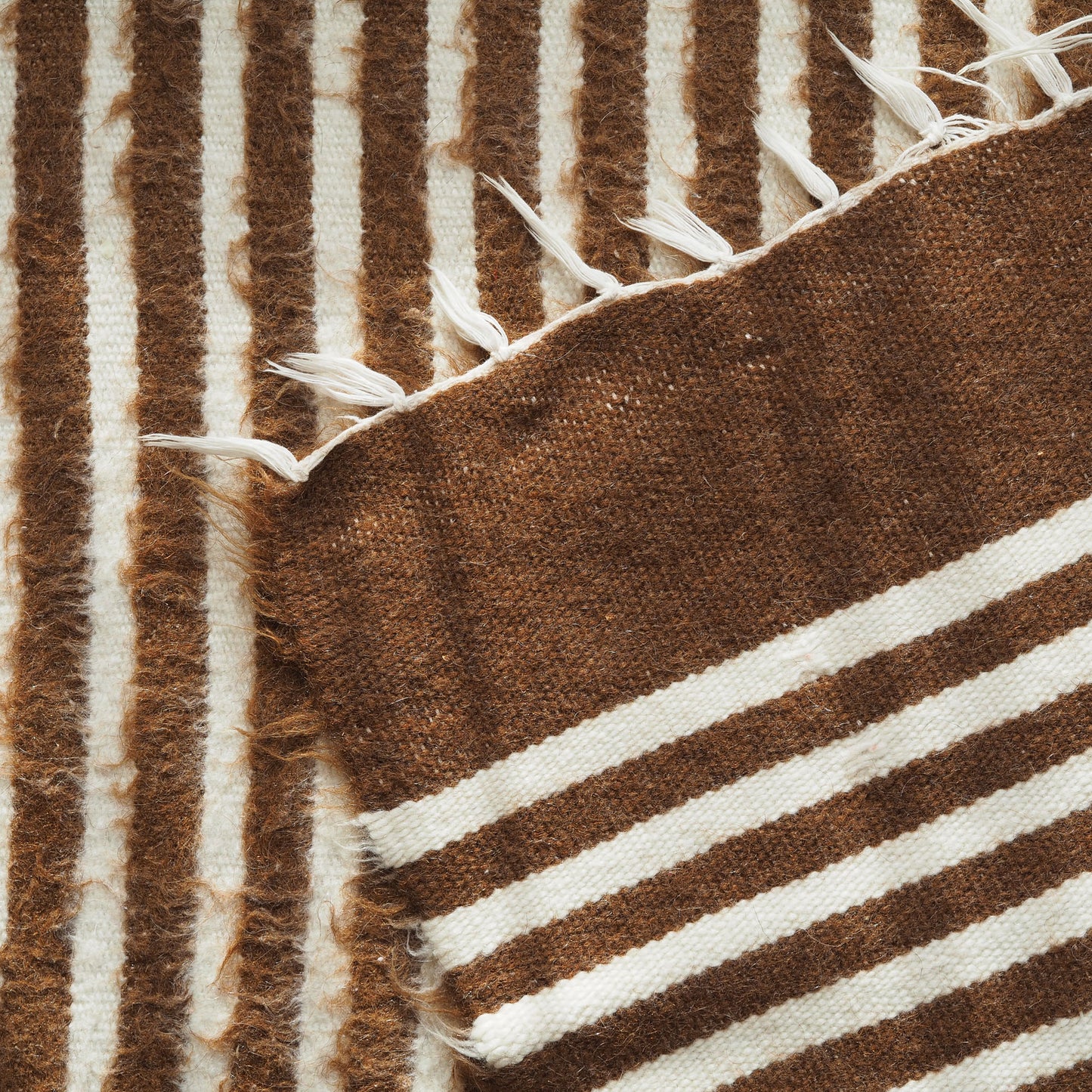 brown-white-striped-wall-hanging-rug