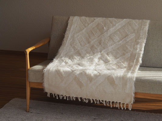 white-wall-hanging-rug